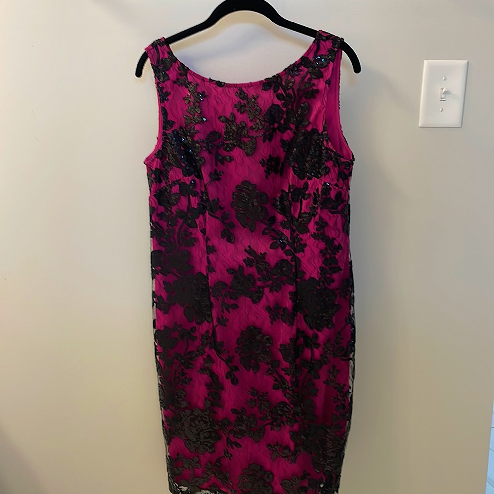 Pink cocktail dress overlayed with black lace flower print